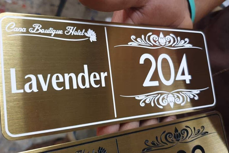 ผลงานป้ายสแตนเลสกัดกรด